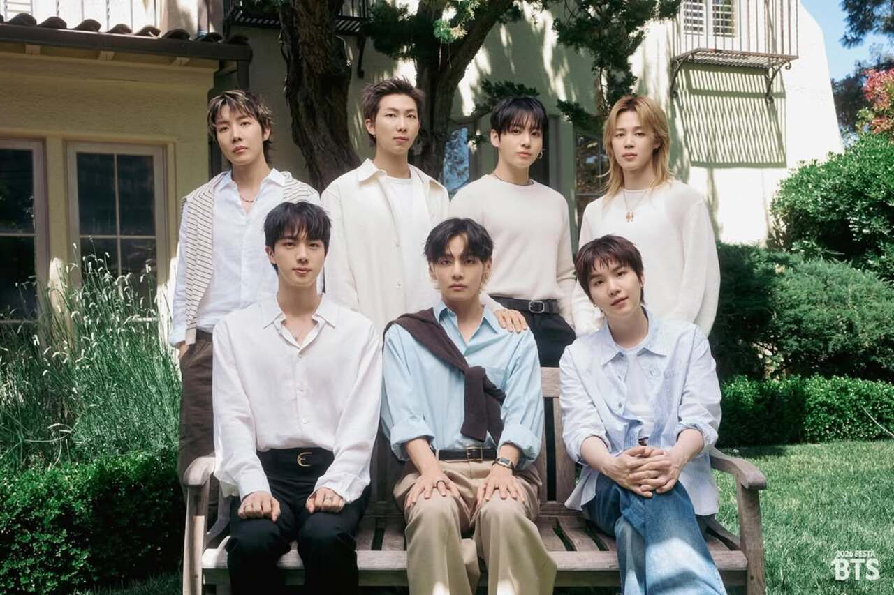 The photos mark the group's 13th debut anniversary, celebrated on June 13. All seven members reunited for the portraits after completing their military service.
