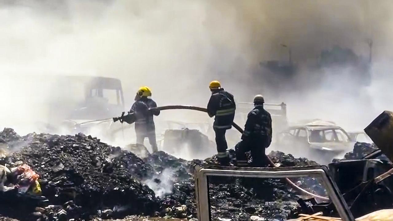 Within minutes, flames engulfed several rows of automobiles, turning many of them into charred shells