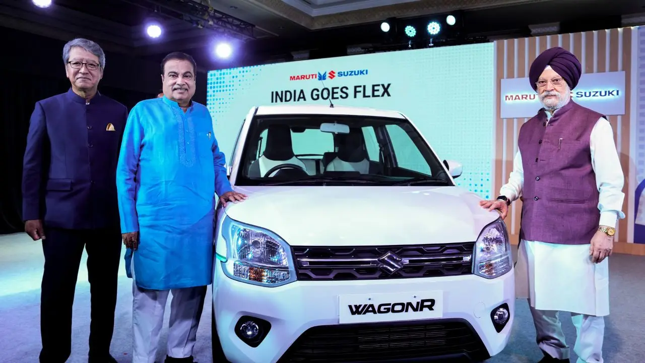 Maruti Suzuki India MD and CEO Hisashi Takeuchi with Union Ministers Nitin Gadkari and Hardeep Singh Puri. (Pic/ PTI)
