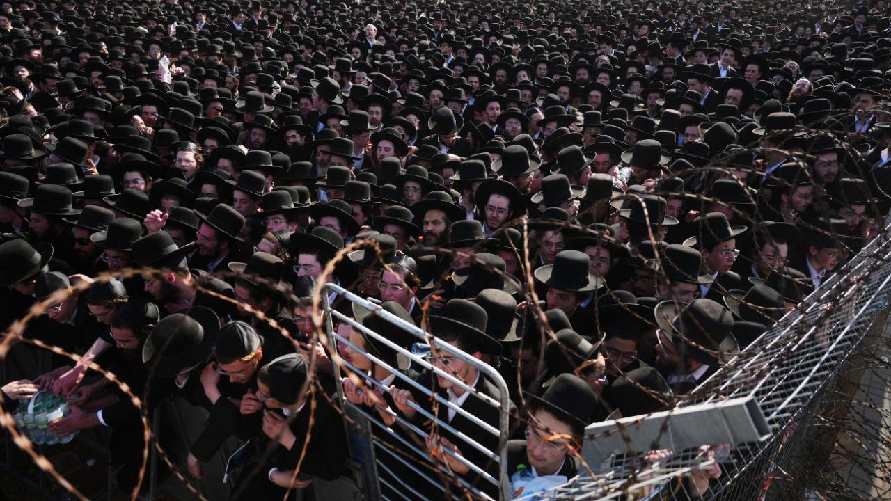 Ultra-Orthodox Jewish men protest against military recruitment and call for release of detained draft resisters outside Bet Lid military prison near Kfar Yona, Israel on Wednesday. (PICS/ AFP)