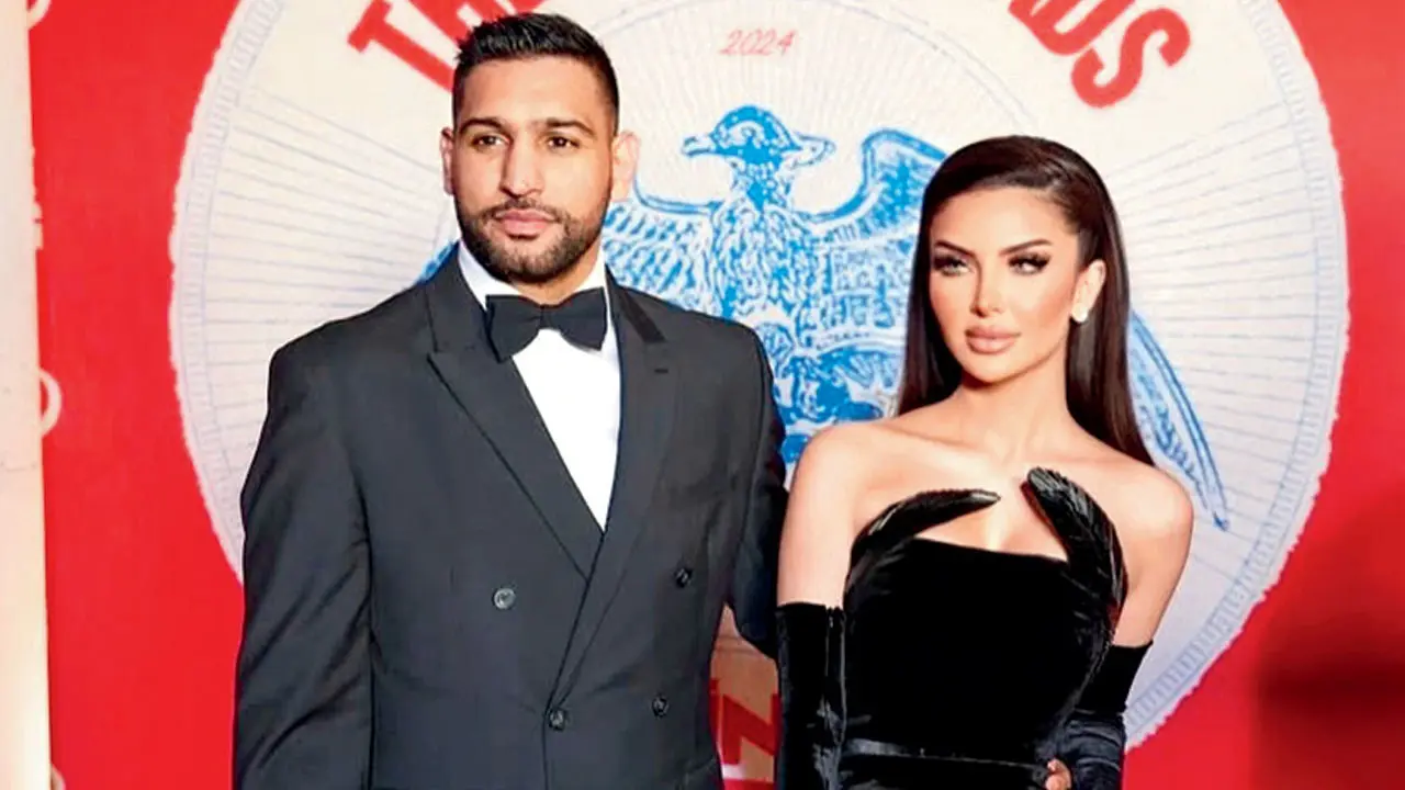 Boxer Amir Khan sues over sex scandal Amir Khan and wife Faryal Makhdoom. Pic/Khan’s Instagram
