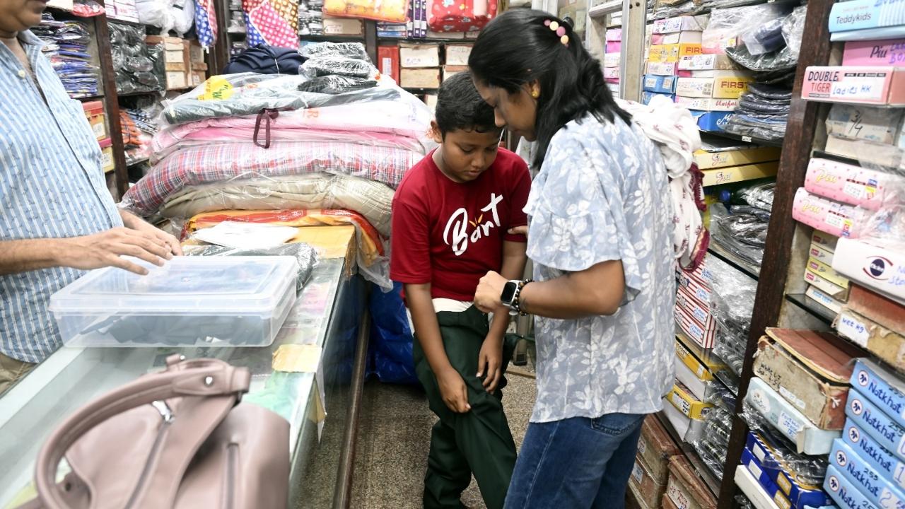 Families in Mumbai were seen preparing for the start of classes Families in Mumbai were seen preparing for the start of classes
