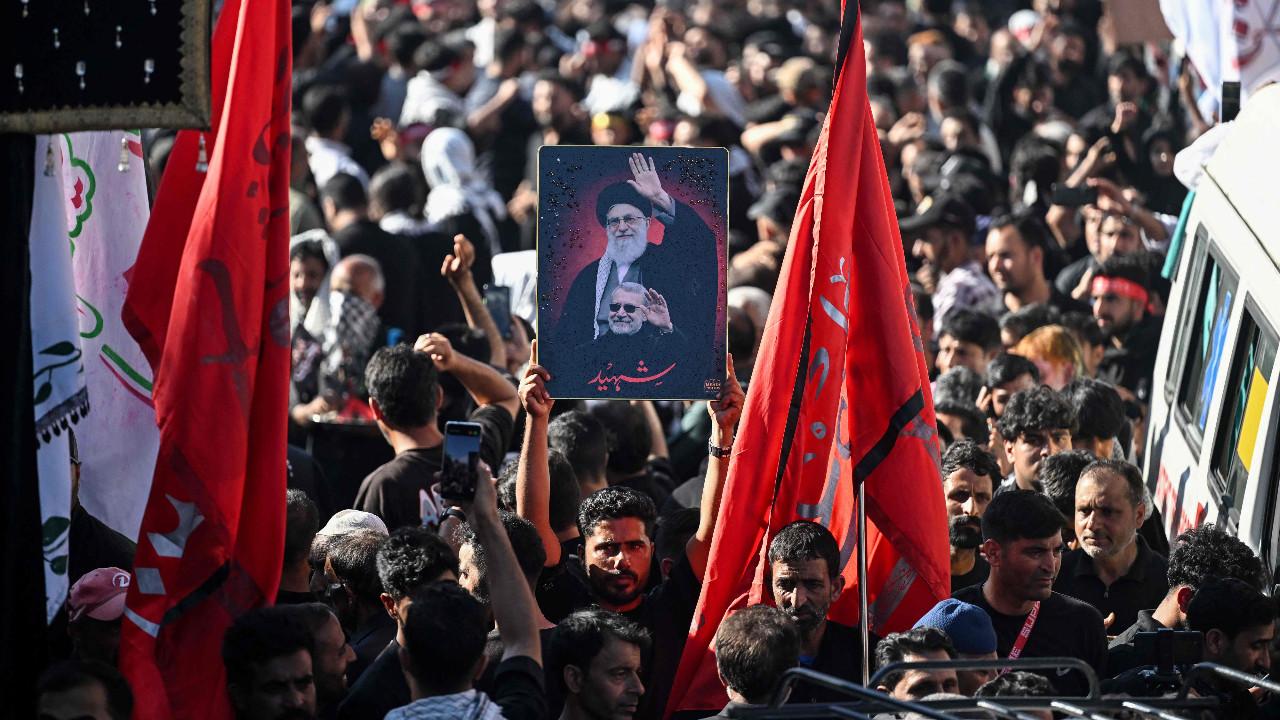 A large number of Shia Muslims gathered on the streets of Srinagar on Wednesday to participate in Muharram procession. Photo Courtesy: AFP and PTI