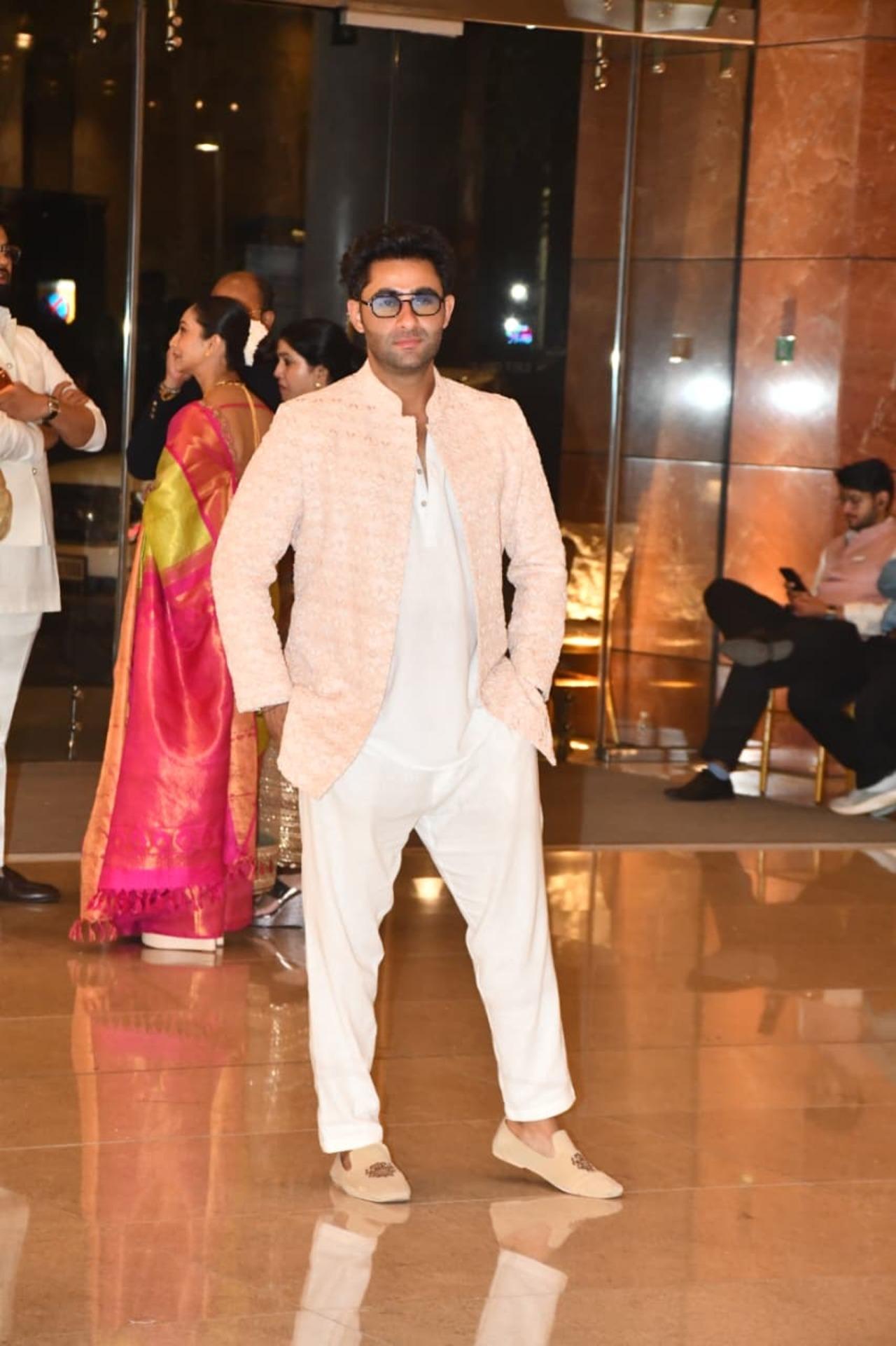 Aadar Jain keeps it desi with pastel shades for the outfit