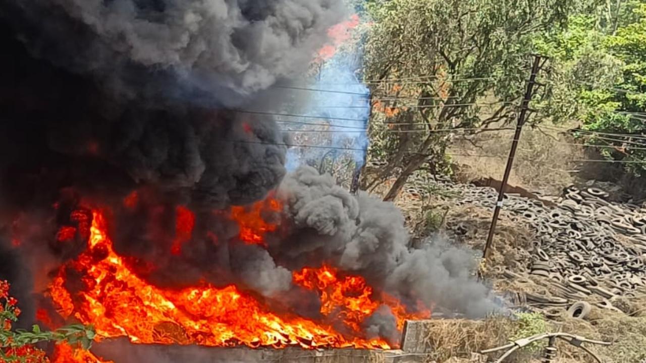 Thick smoke was seen rising from the area as firefighters worked to prevent the fire from spreading to nearby locations