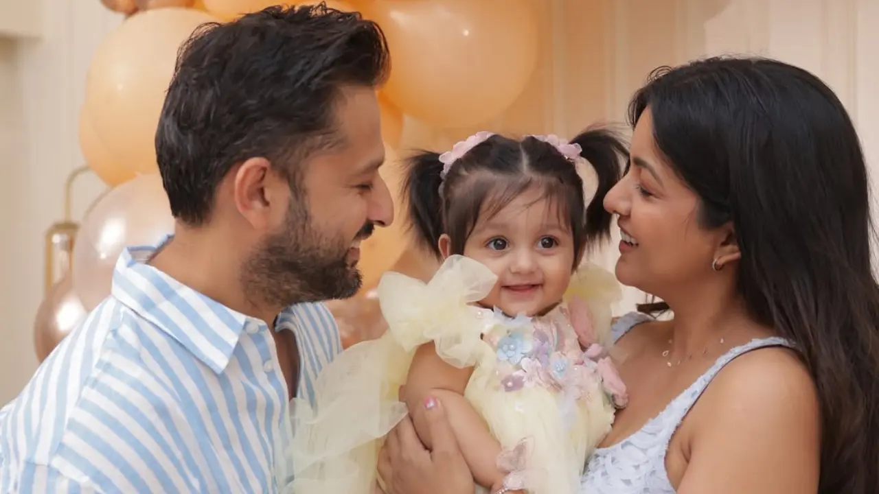 Ishita Dutta and Vatsal Sheth reveal their daughter Veda's face on 1st birthday Ishita Dutta and Vatsal Sheth with daughter Veda. Pic via Instagram