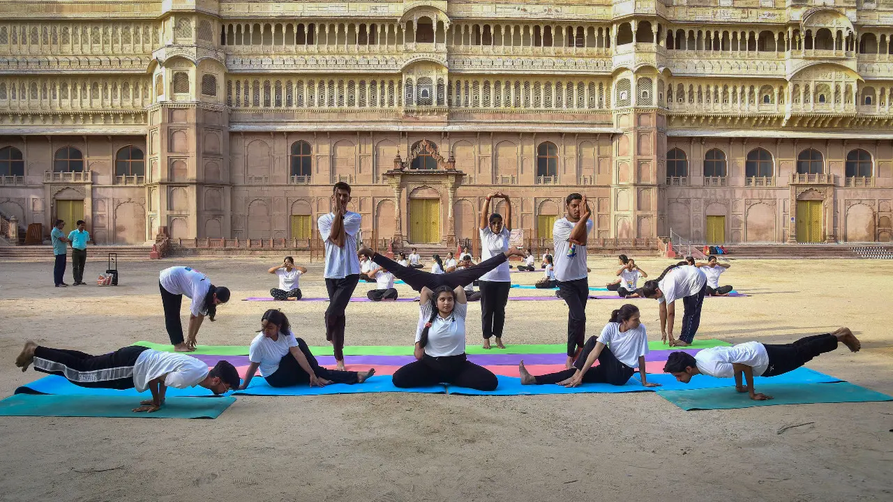 From parks to public spaces, yoga enthusiasts across India gear up for International Yoga Day. Photo Courtesies: PTI