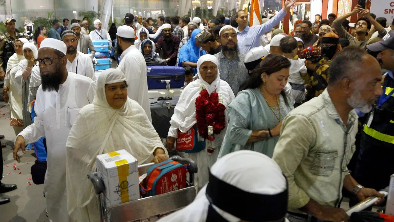 IN PHOTOS: Stranded Umrah pilgrims return to Ahmedabad, families thank govt  