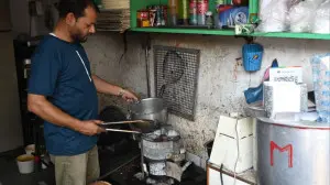 IN PICS: LPG crisis forces Borivali caterer to switch to charcoal cooking