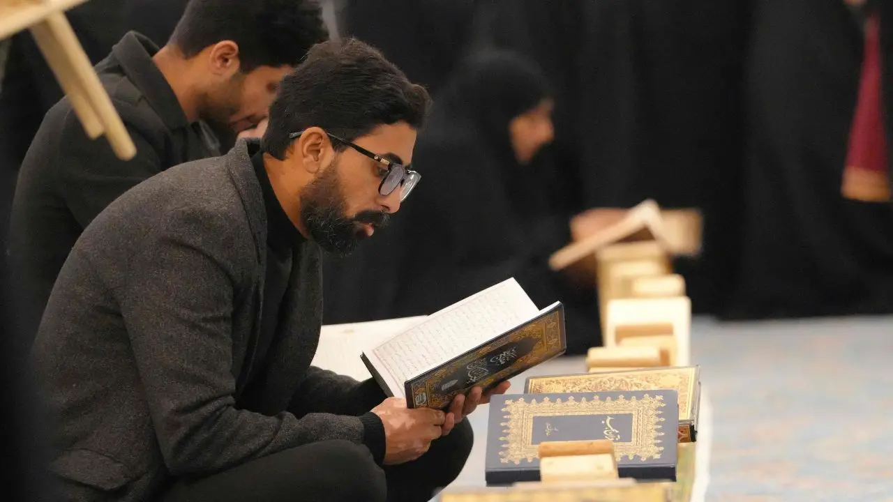 Shia Muslim faithful gather at the historic Kufa Mosque in the holy city of Kufa, south of Baghdad, to observe Itikaf, a spiritual retreat during the blessed nights of Laylat al-Qadr in Ramadan