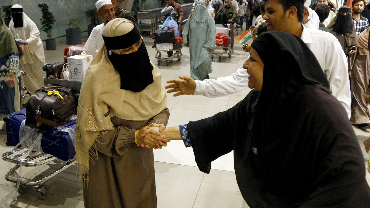 An Indian passenger being welcomed by family members upon her arrival on a flight from Saudi Arabia, amid the ongoing Iran-Israel conflict