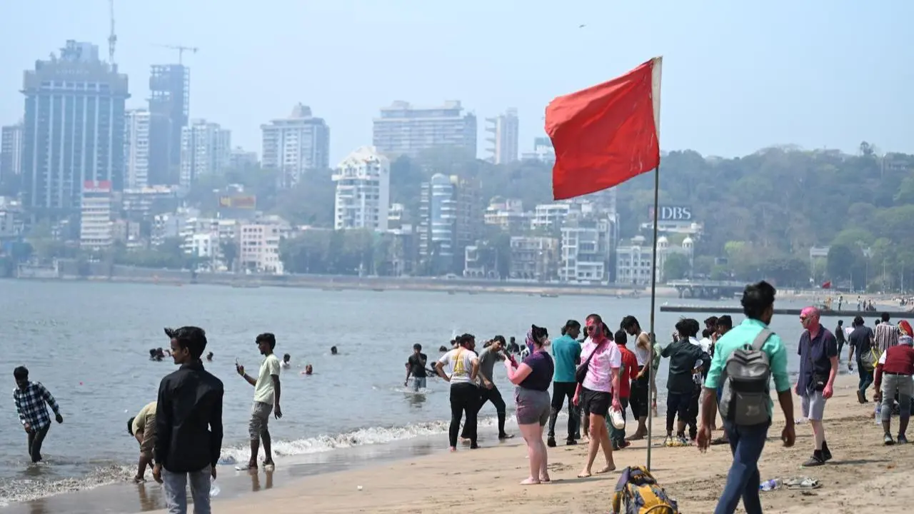 Revellers jumped into the waves and soaked each other in colour as Holi festivities took over chowpatty on a bright sunny day 