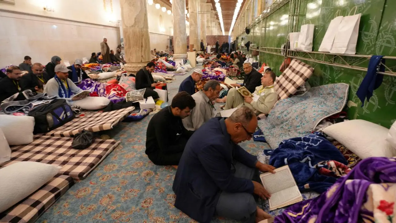 Devotees bow in prayer at the Kufa Mosque during Itikaf, seeking the blessings and forgiveness that are believed to be abundantly available on the holy nights of Laylat al-Qadr during Ramadan