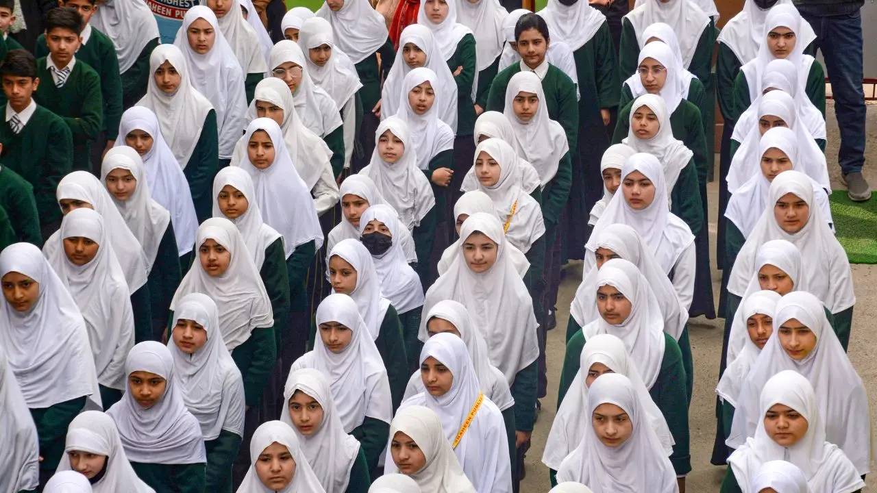 <p>Students attend the morning assembly as educational institutions reopen after a week-long closure due to major protests at Lal Chowk, Saida Kadal, Budgam, Bandipora, Anantnag and Pulwama in Kashmir which has about 15 lakh Shias</p>