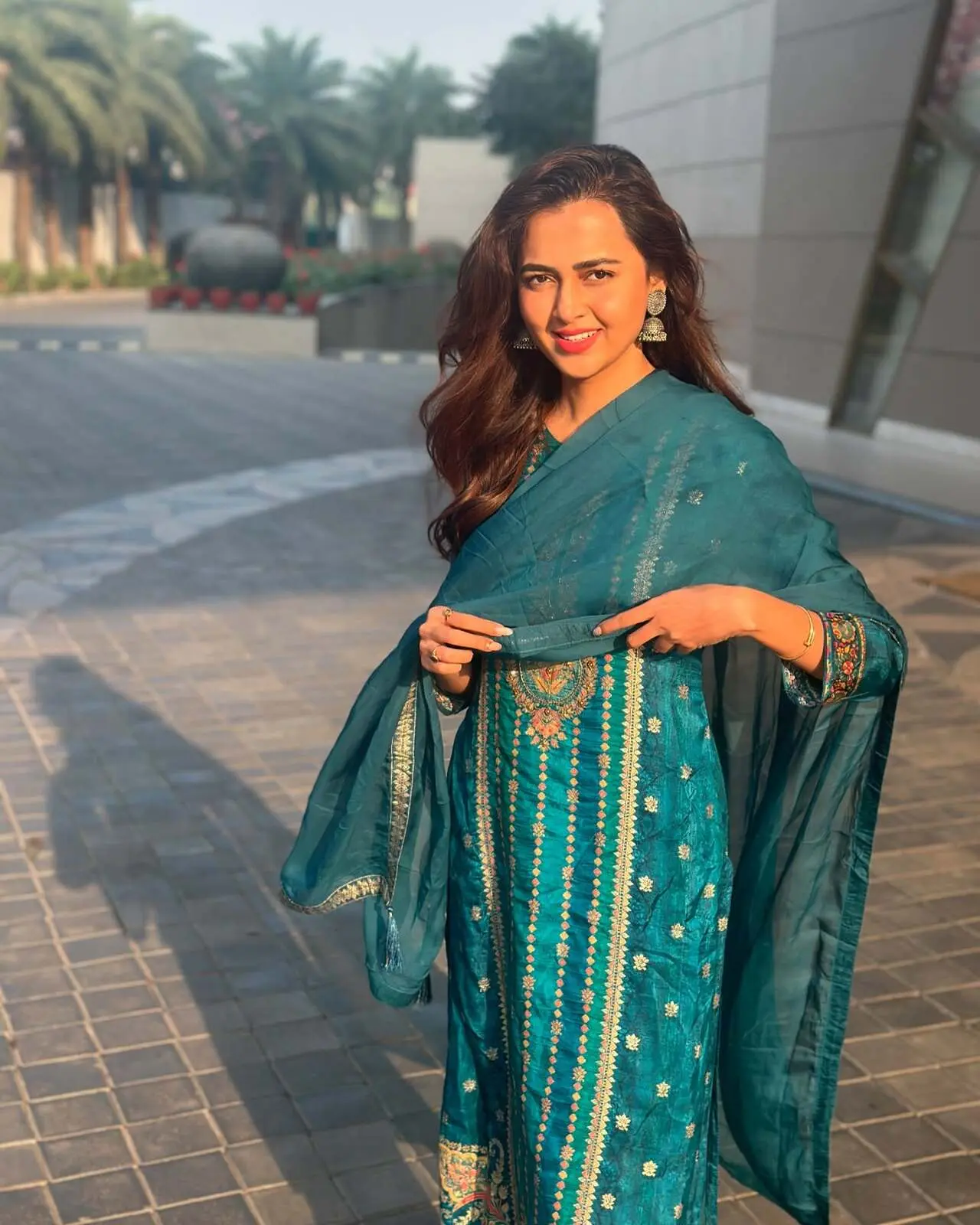 <p>Tejasswi Prakash looks effortlessly elegant in a dark green suit embellished with gold lones and delicate buttis, paired with a simple, flowy dupatta.</p> <p>Tejasswi Prakash looks effortlessly elegant in a dark green suit embellished with gold lones and delicate buttis, paired with a simple, flowy dupatta.</p>