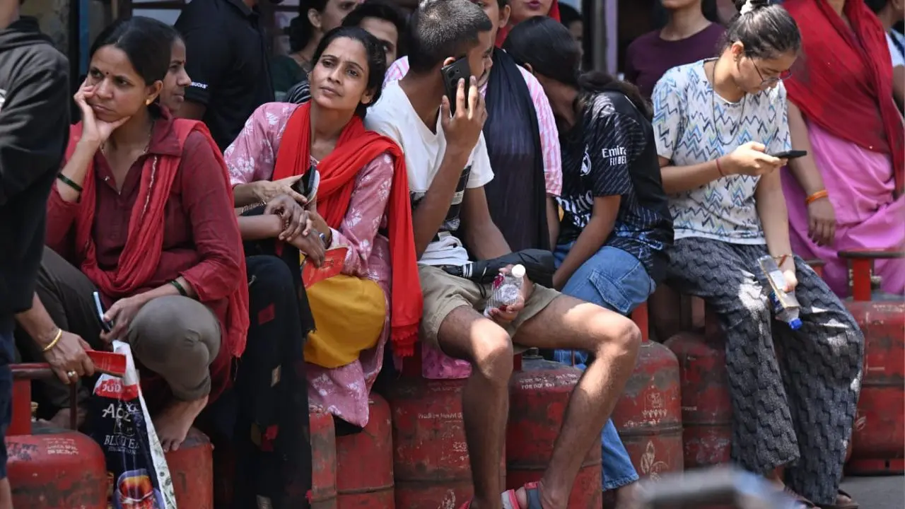 Cooking gas has become a precious commodity in Mumbai as residents wait under the blazing sun just to secure a single LPG cylinder