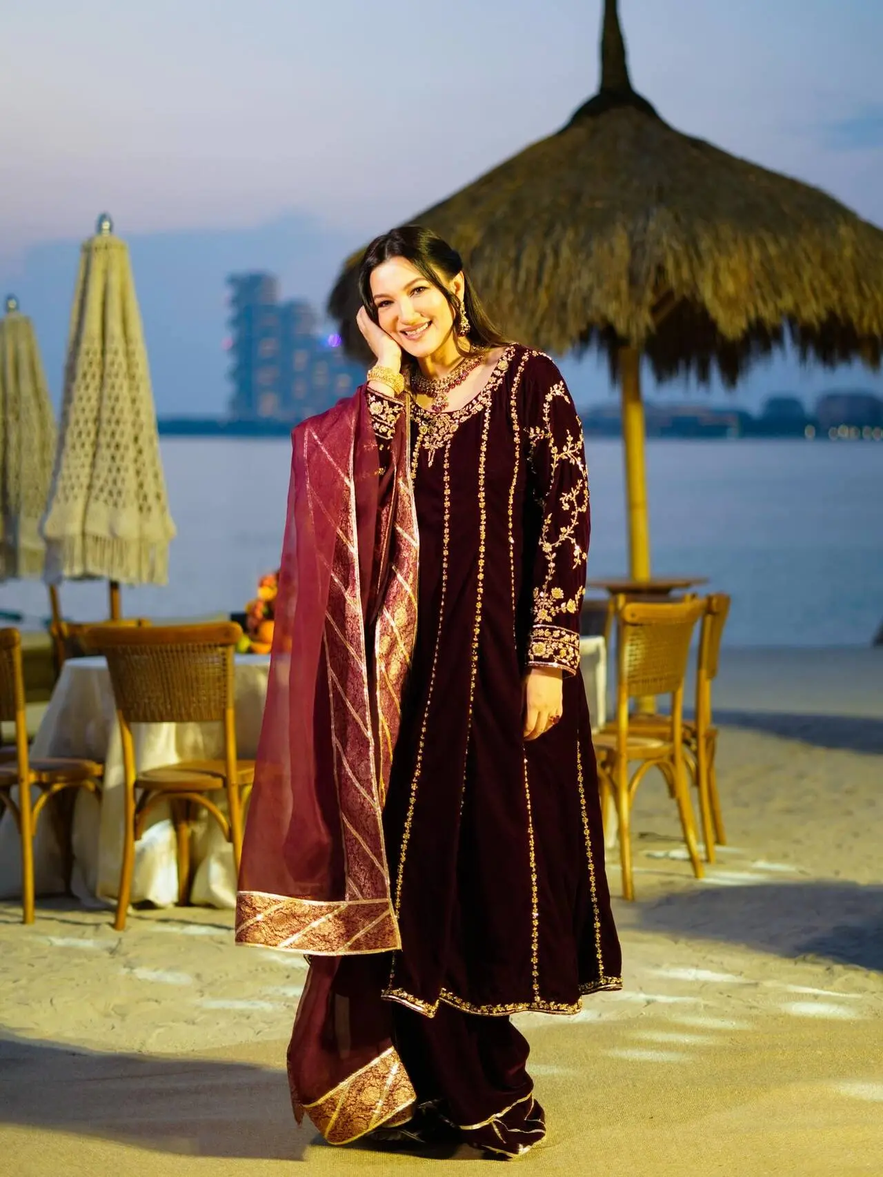 <p>Gauahar Khan looks stunning in a maroon velvet suit featuring elegant gold linings. The rich velvet fabric and intricate gold detailing make it a perfect choice for Eid celebrations or festive evening gatherings.</p> <p>Gauahar Khan looks stunning in a maroon velvet suit featuring elegant gold linings. The rich velvet fabric and intricate gold detailing make it a perfect choice for Eid celebrations or festive evening gatherings.</p>