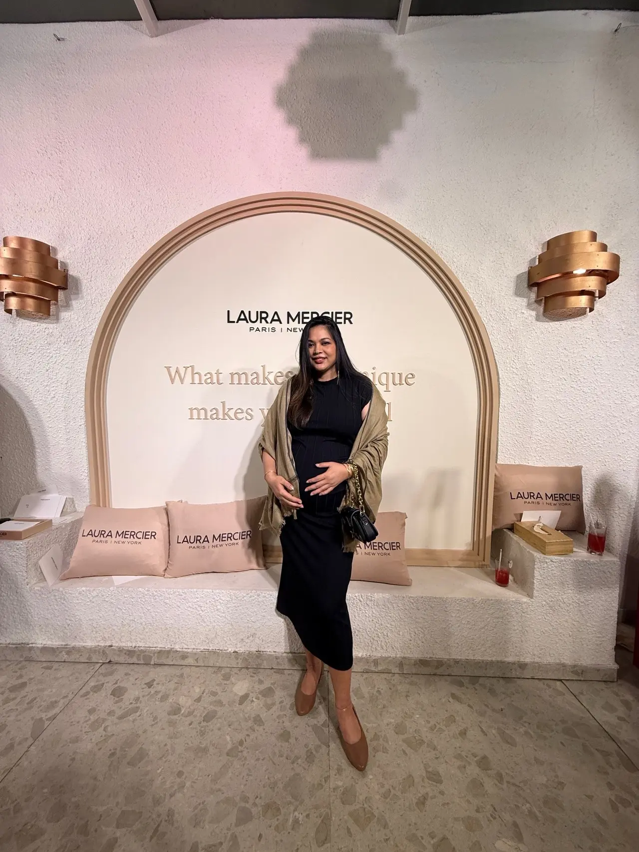 Lin Laishram kept her maternity style effortlessly chic in this look, opting for a sleek black body-hugging midi dress that beautifully highlighted her baby bump.