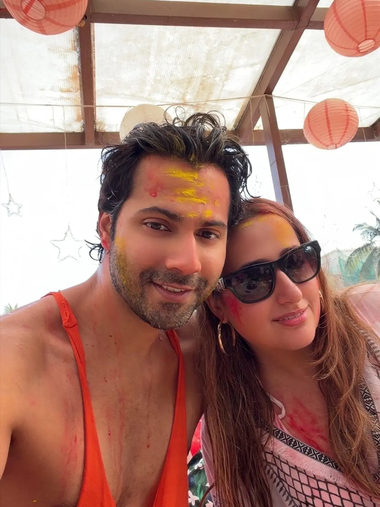While Varun Dhawan shared romantic pics with wife Natasha as they two are drenched in colours. He wrote, 