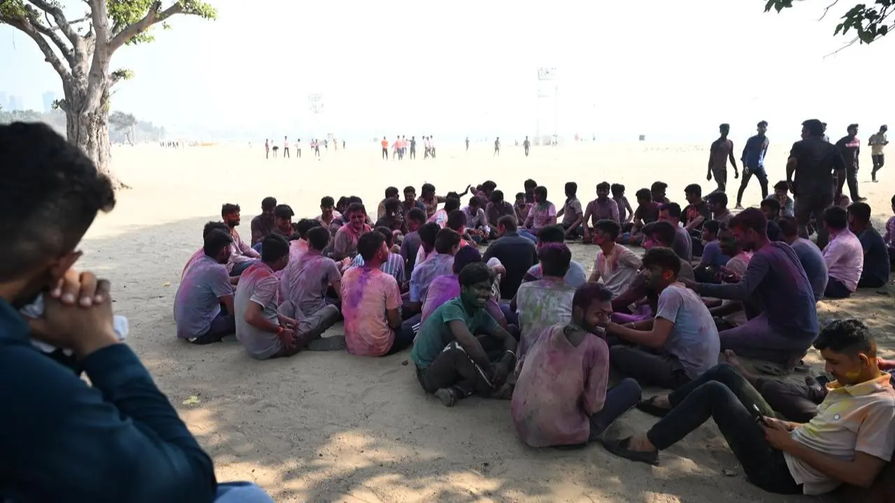 People of all ages took to chowpatty to play Holi, with colours, water and sunshine making it a perfect festive day out