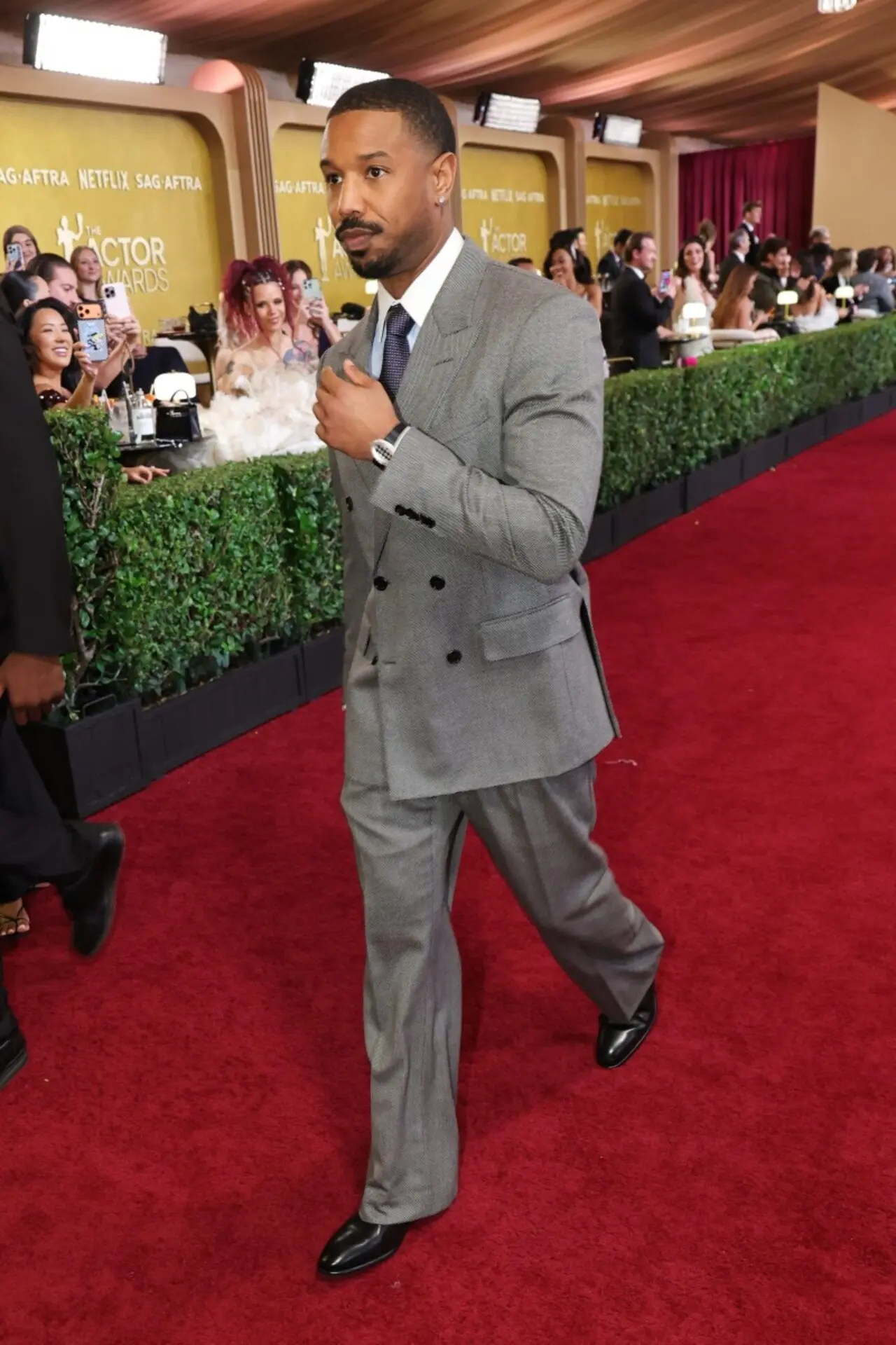 Michael B Jordan wore a grey double-breasted suit for the night keeping it classy in a white shirt and blue bowtie.