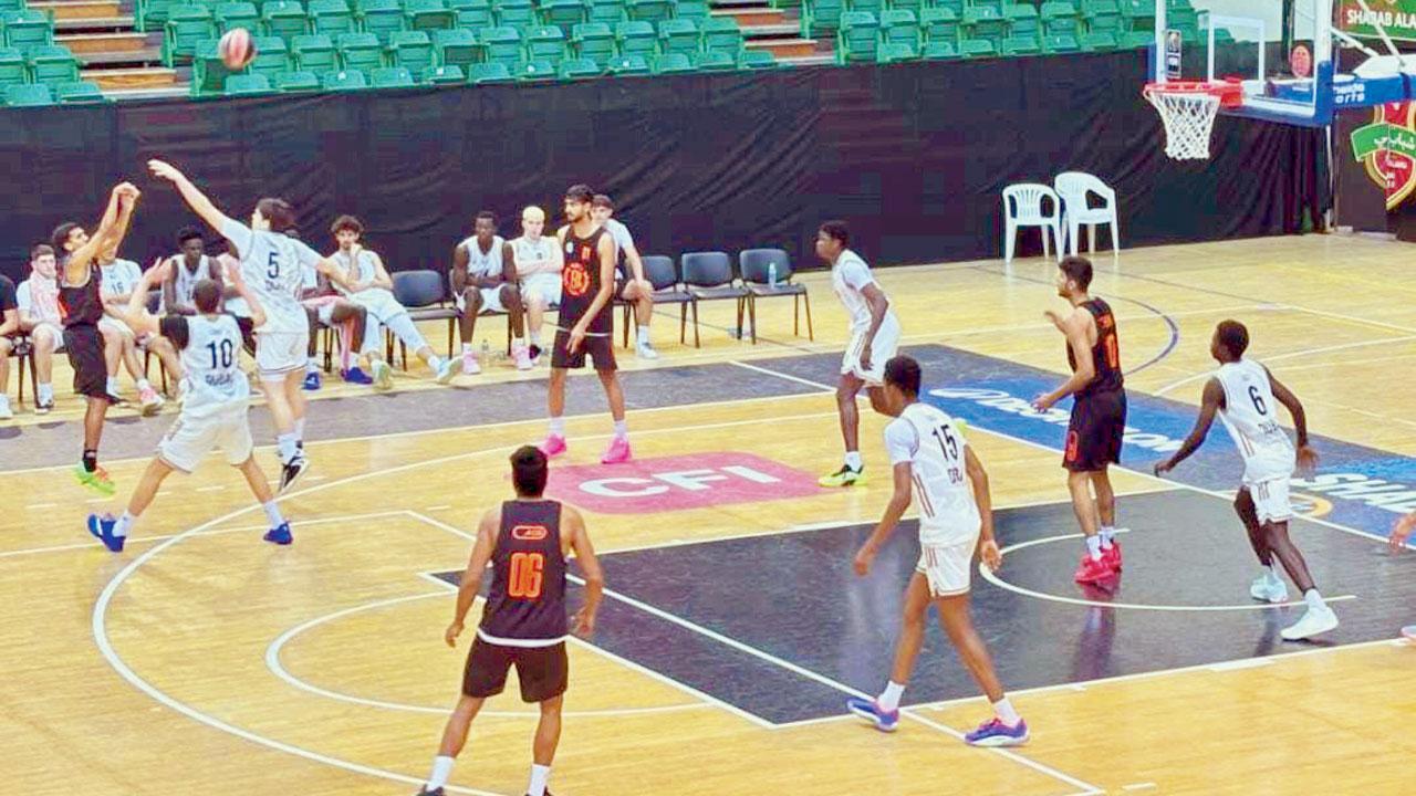 India’s Aaron Monteiro (extreme left) attempts a three-pointer during a practice match in Dubai recently. Pics/By Special Arrangement