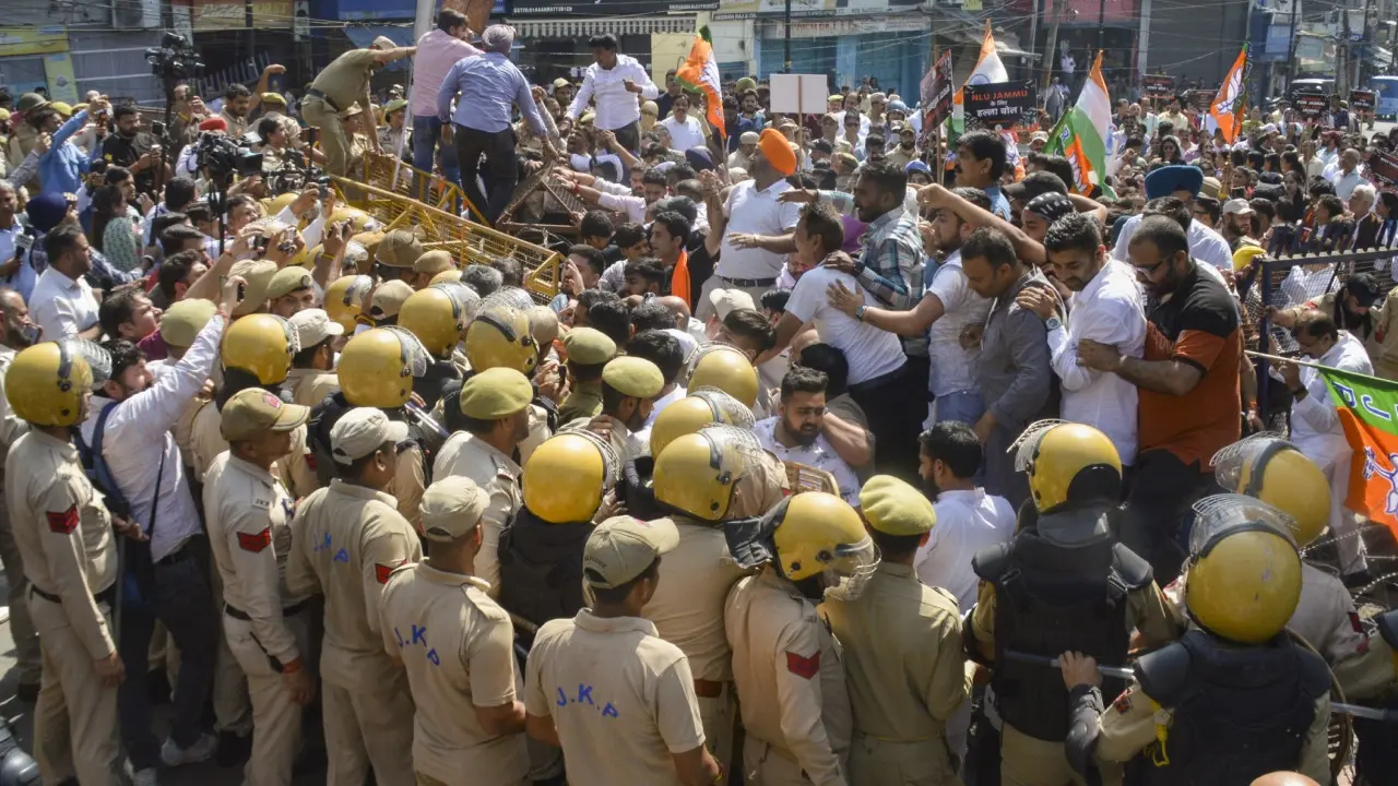IN PHOTOS: BJP workers protest, storm police barricades in Jammu