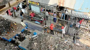 Western Railway installs 3-metre fencing near Bandra tracks to stop dumping