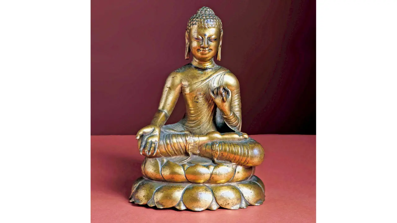 An 8th Century bronze sculpture of The Buddha