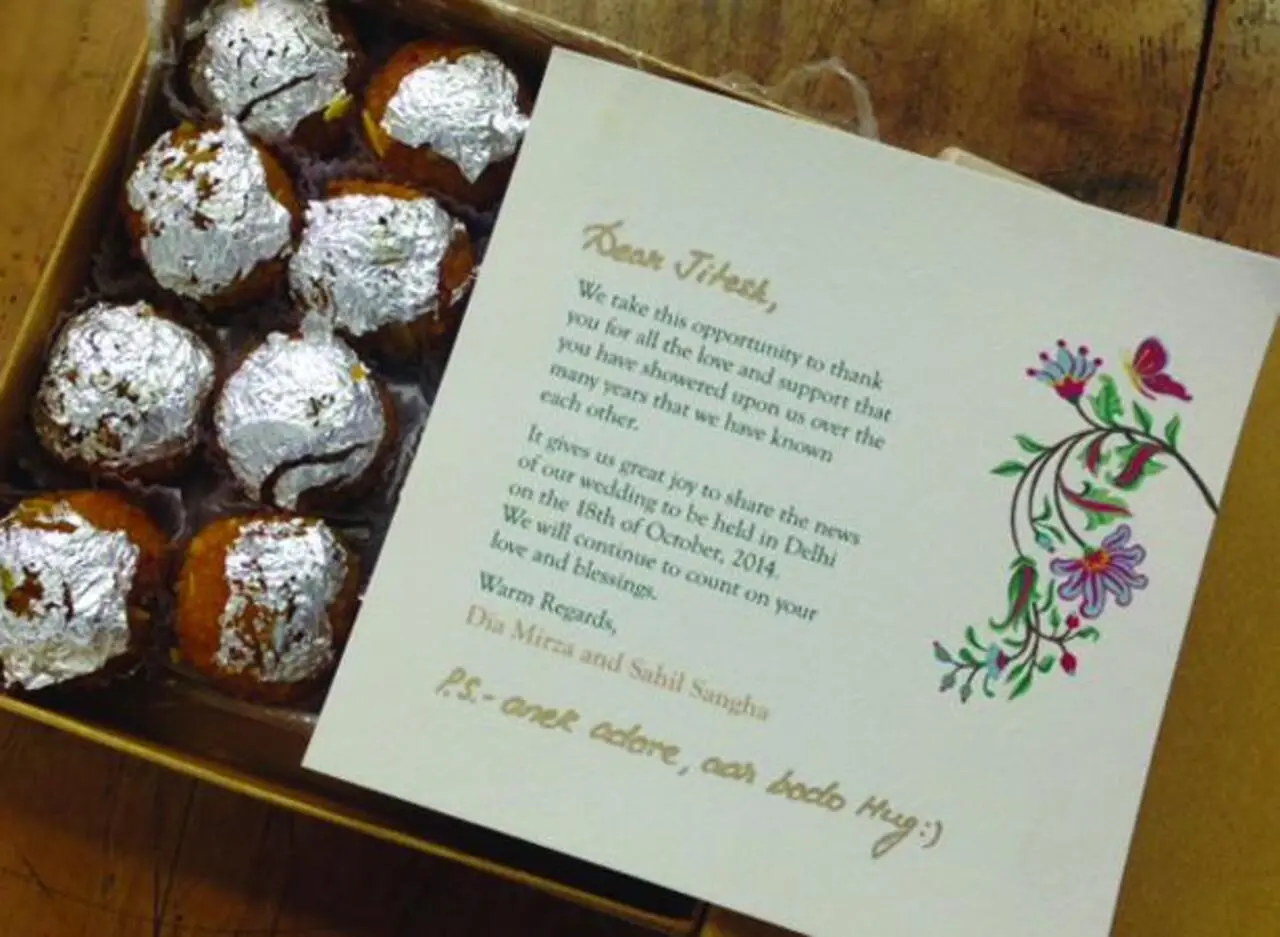 Dia Mirza and Vaibhav Rekhi's wedding invitation card was rather simple yet elegant with simple text and a colourful floral design on one side.