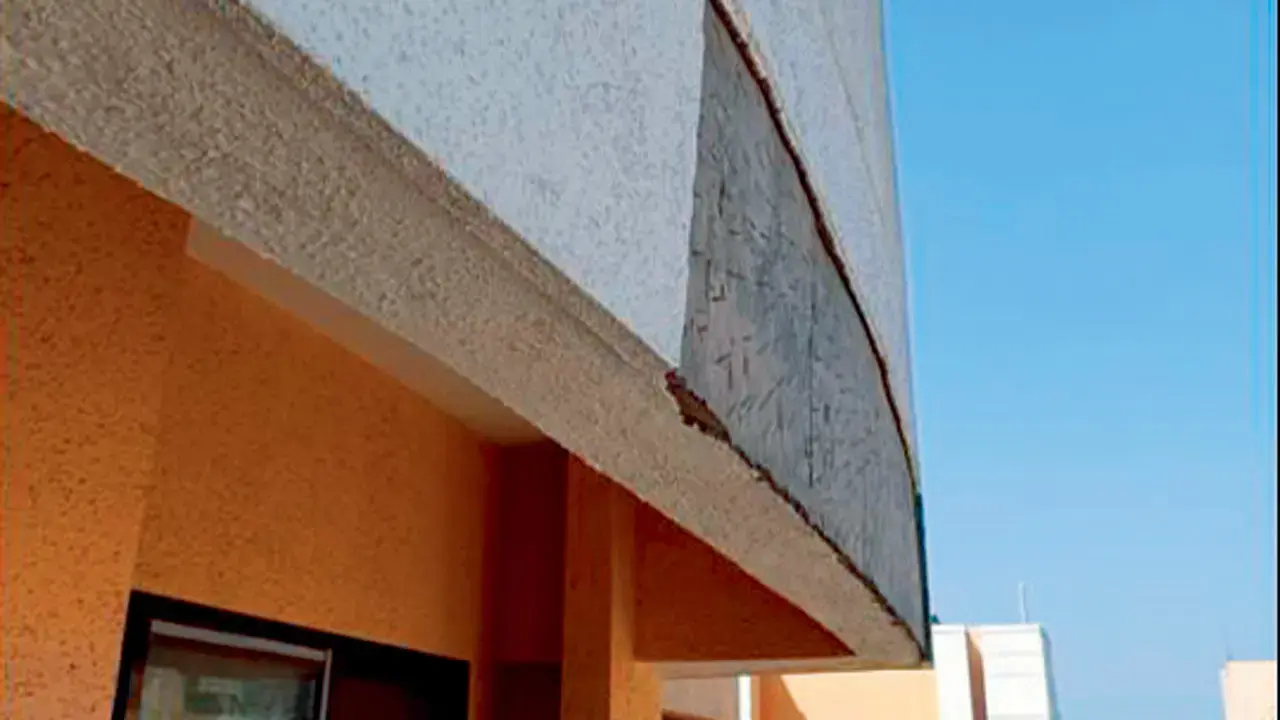 Chunks of plaster and concrete that have fallen from the building add to safety concerns raised by residents. (PIC/ SPECIAL ARRANGEMENT)