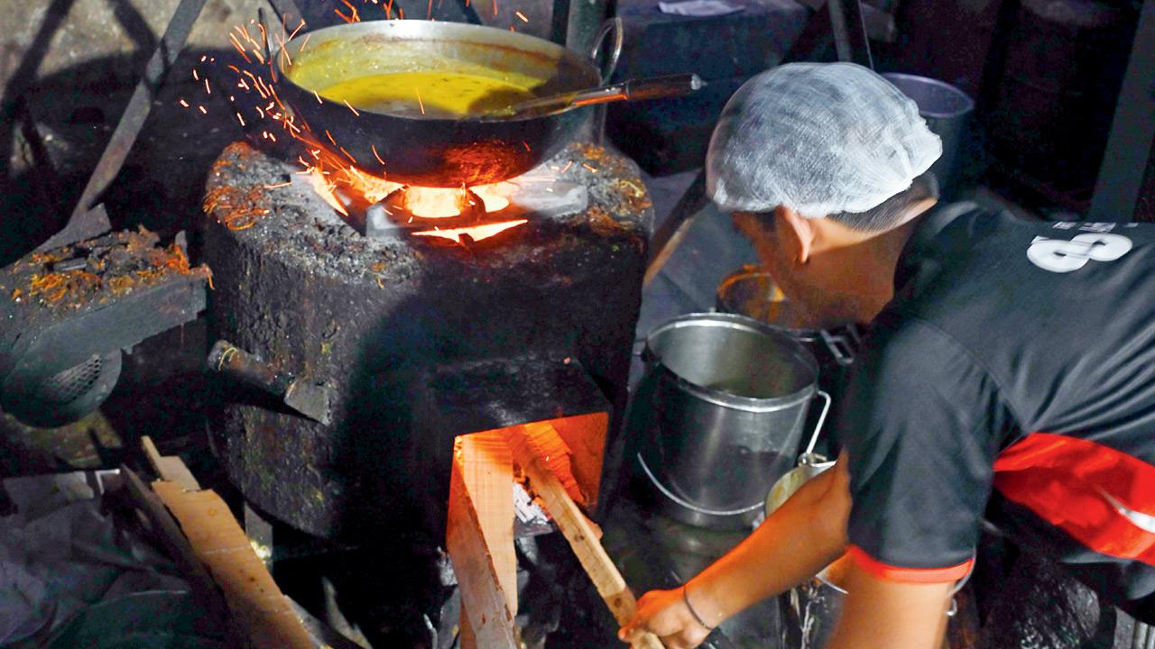 Malvan Cha Kinara in Worli uses firewood to cook. Pic/Ashish Raje