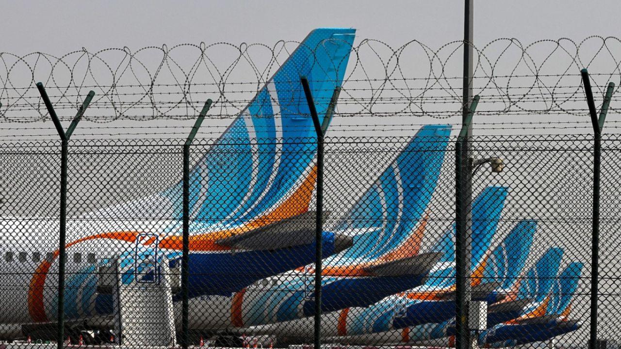 FlyDubai airline planes are parked on the tarmac at Dubai International Airport on Monday. PIC/AFP