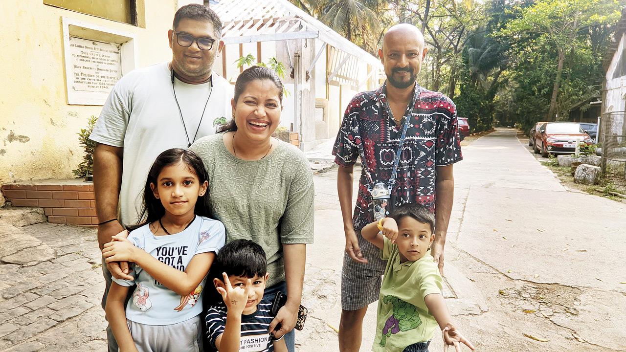 Harshita Charatker and family, who rescued a fallen barn owl
