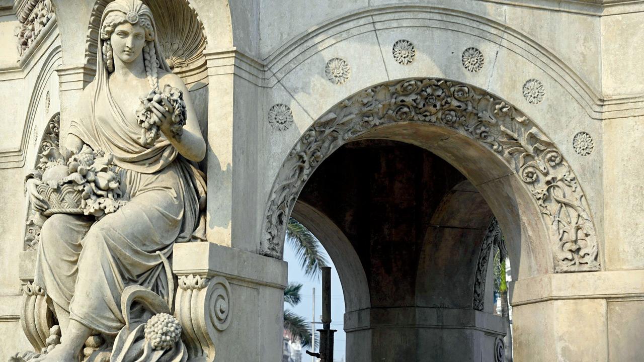 An allegorical figure representing the edible produce of India, seated in a niche in the portion above the basin of the fountain