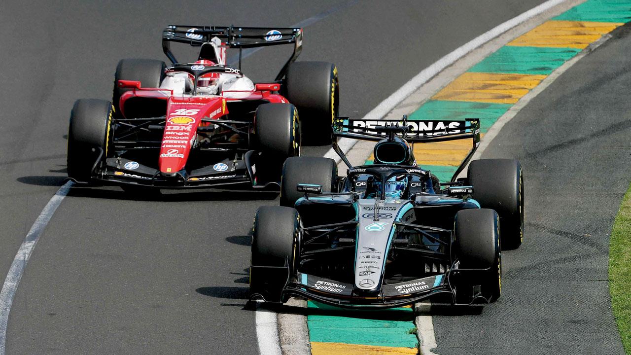 George Russell (right) has Ferrari’s Charles Leclerc hot on his heels at Melbourne on Sunday