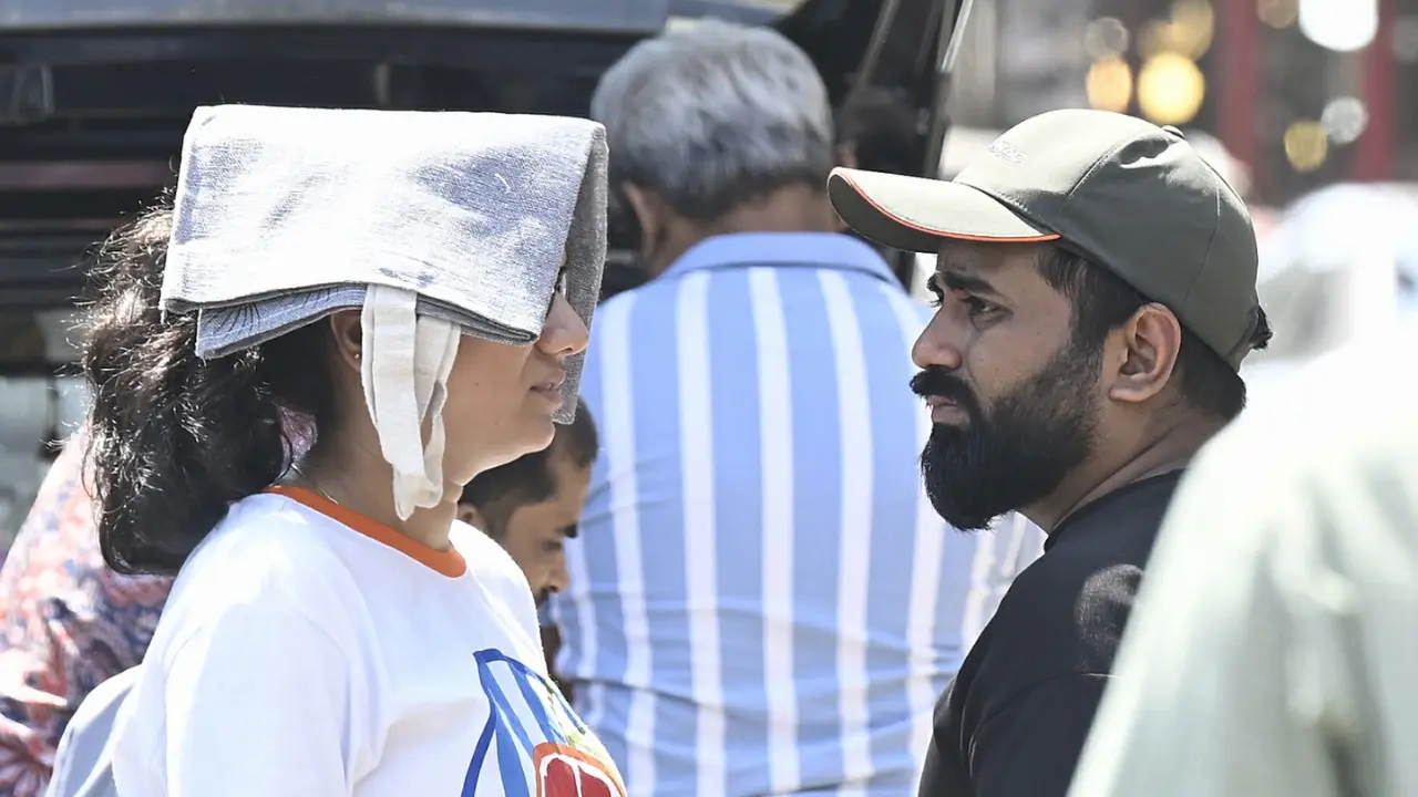 From Worli Seaface and Metro cinema in Dhobi Talao to Crawford Market and Abdul Rehman Street, residents were seen braving the scorching sun, covering their faces, drinking water, and purchasing bottles to stay hydrated