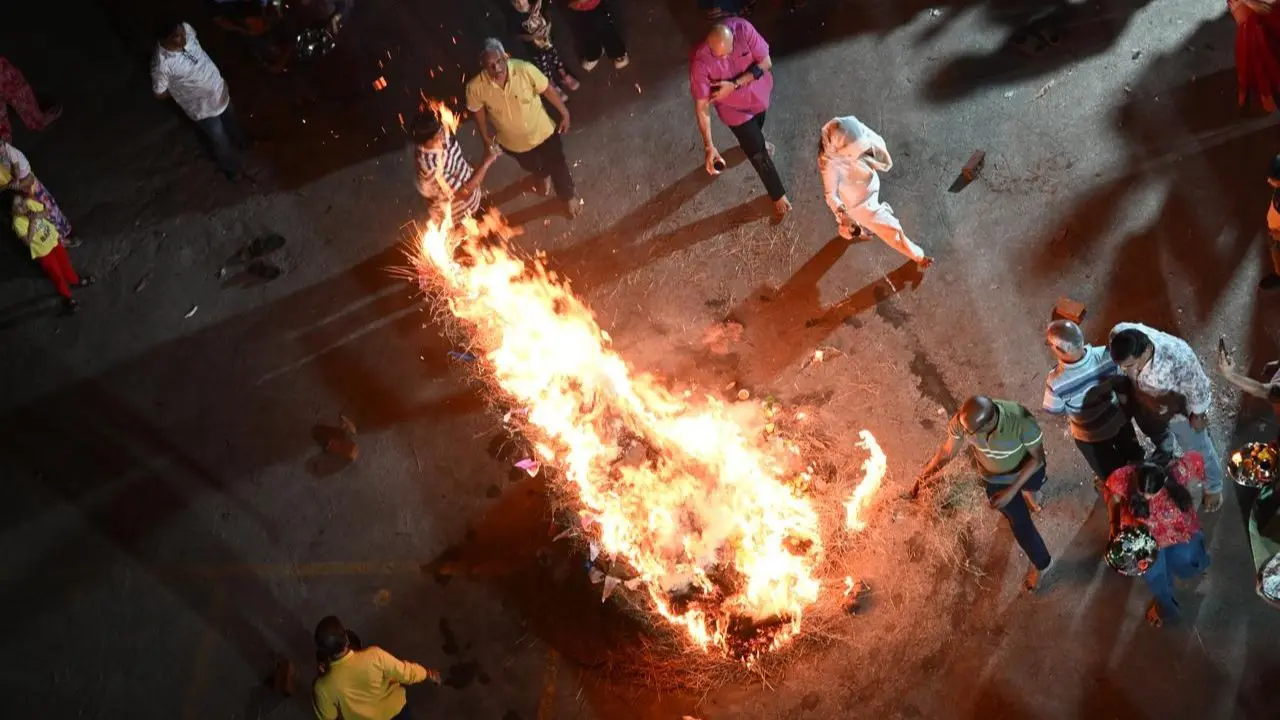Triumph of good over evil: Glimpses of Holika Dahan rituals from Sion, Mahim