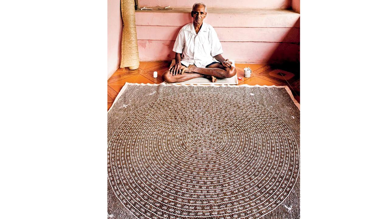 Mashe with his Warli art. Pic courtesy/ Antonio Martinelli
