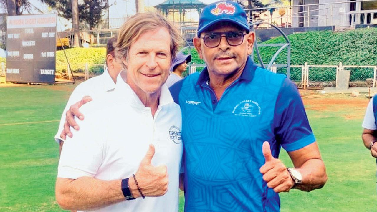 Jonty Rhodes (left) and MCA coach Pradeep Sunderam