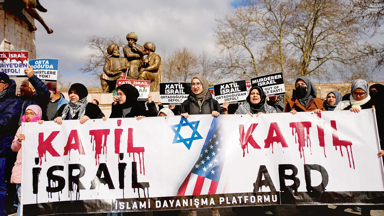 A protest against the US and Israeli strikes on Iran, in Istanbul, Turkey, on March 1. The family’s flight to Doha, Qatar was diverted to the Turkish capital on February 28 and they managed to fly to Delhi via Uzbekistan three days later. PIC/AP/PTI