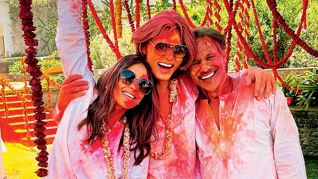 Liz and Damian Hurley with Arun Nayar