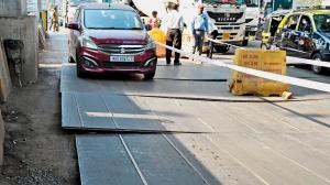 Metal sheets laid for water project turn busy Bandra junction into choke point