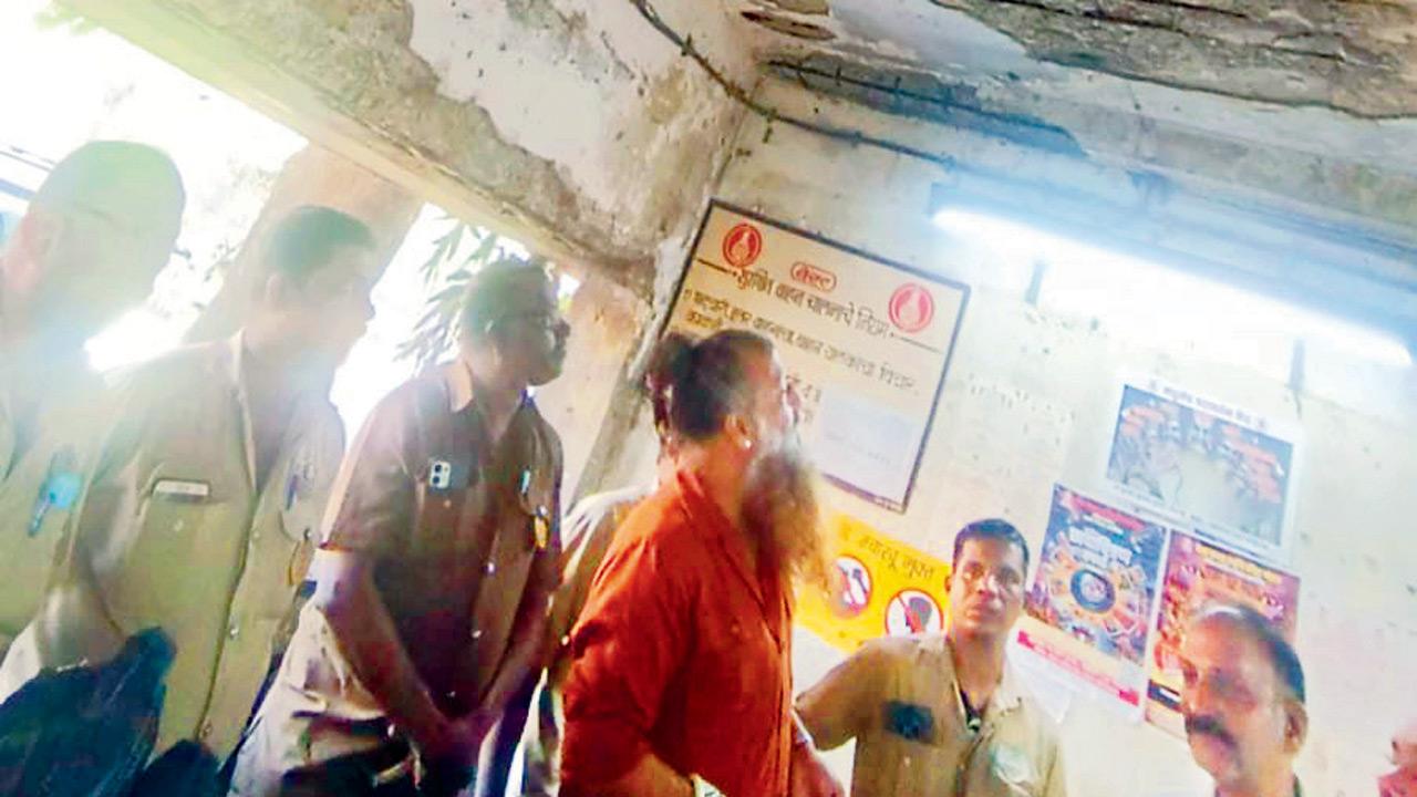 A cracked roof slab inside the Mulund bus depot that raises concerns about safety of staff