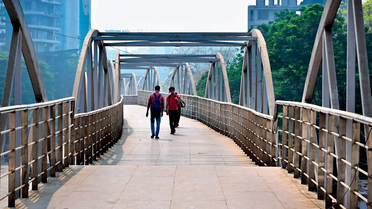 Santacruz skywalk’s missing roof turns daily commute into a scorching ordeal