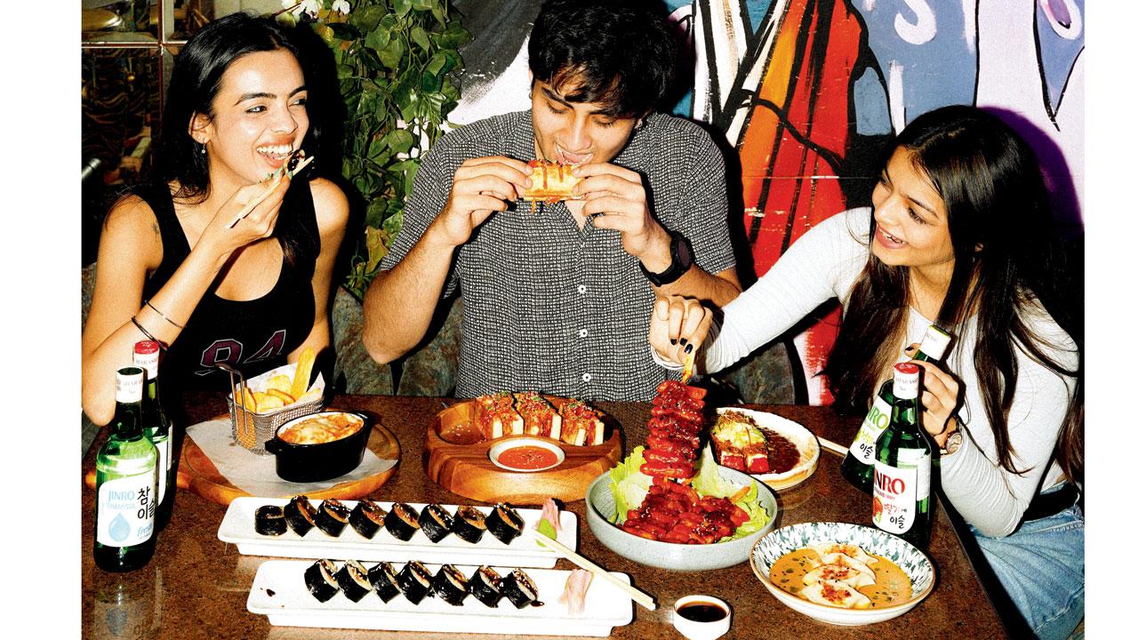 Diners enjoy a meal at the festival. Pics Courtesy/Tipsy Tiger Garden Bar