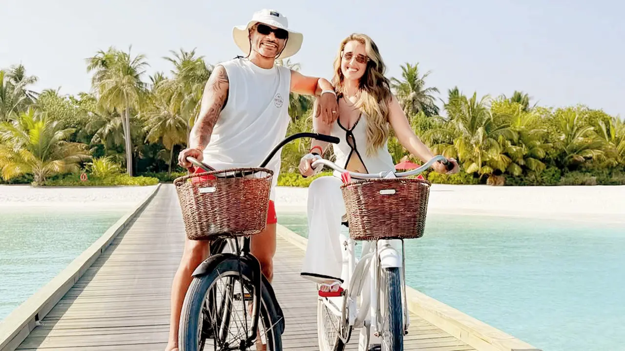 Beach-side honeymoon for Shikhar Dhawan, Sophie Shine