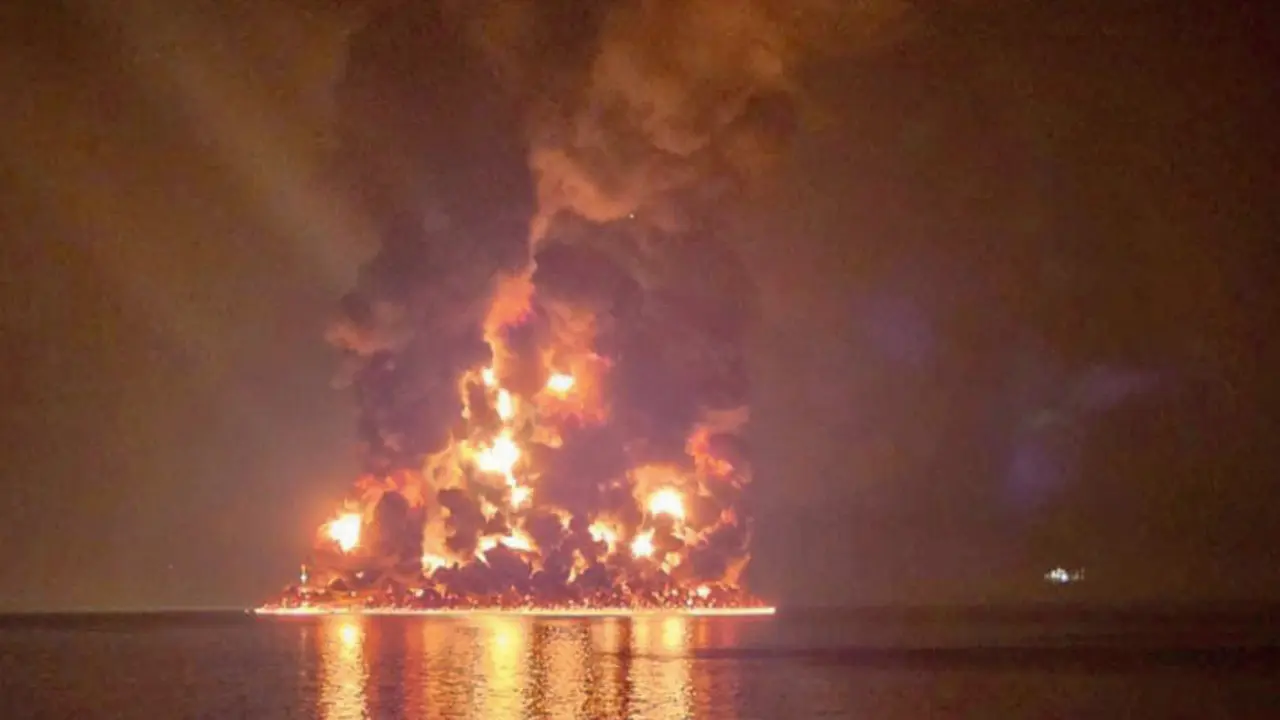 An oil tanker close to Captain Vishwakarma’s vessel goes up in flames on March 11. Pics/By Special Arrangement