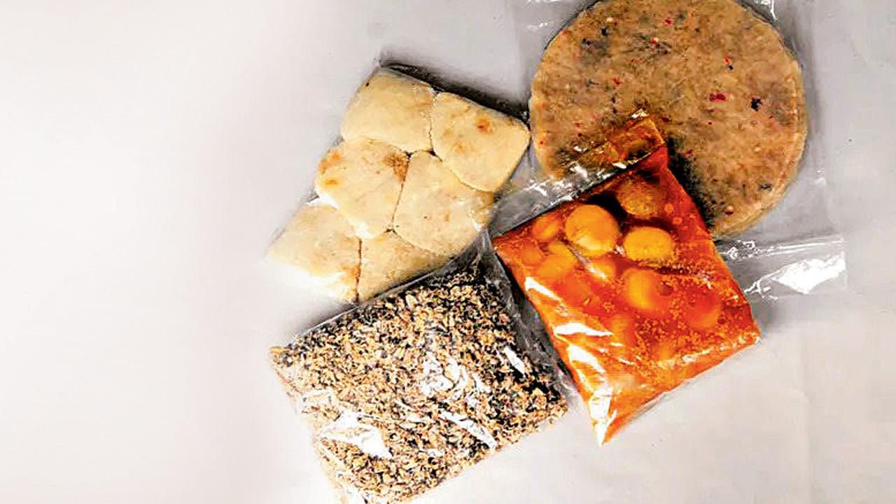 (Clockwise from left) Kachri, Dried Drumstick Flowers; Onion Pickle; Aloo Papad Pic/Atul Kamble