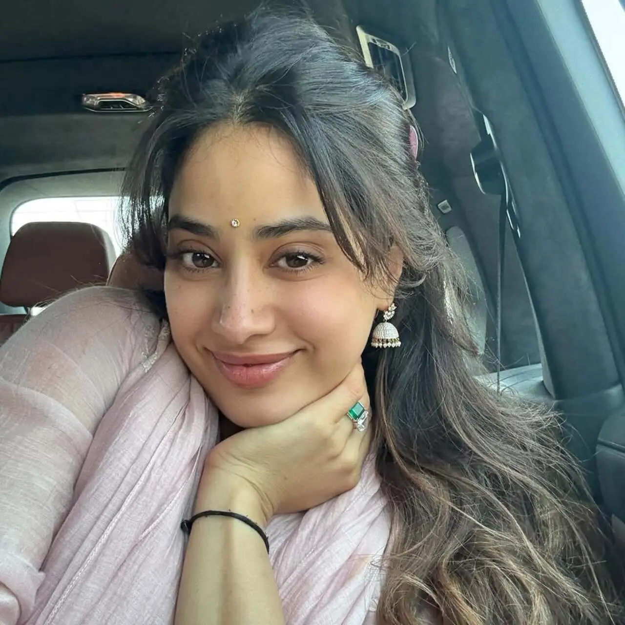 







Janhvi Kapoor also shared a lovely selfie dressed in a soft pink suit. She kept her styling simple with minimal makeup and open hair. Her glowing smile radiates her joy.






